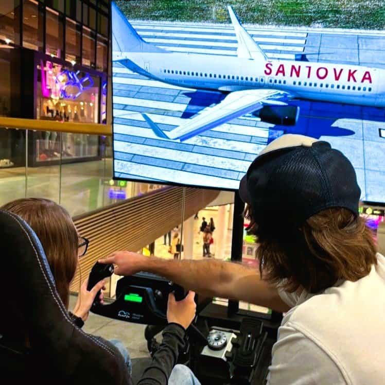 Hire Flight Simulator in Germany Berlin with company logo. Rent airplane simulators for company event celebration in European Union